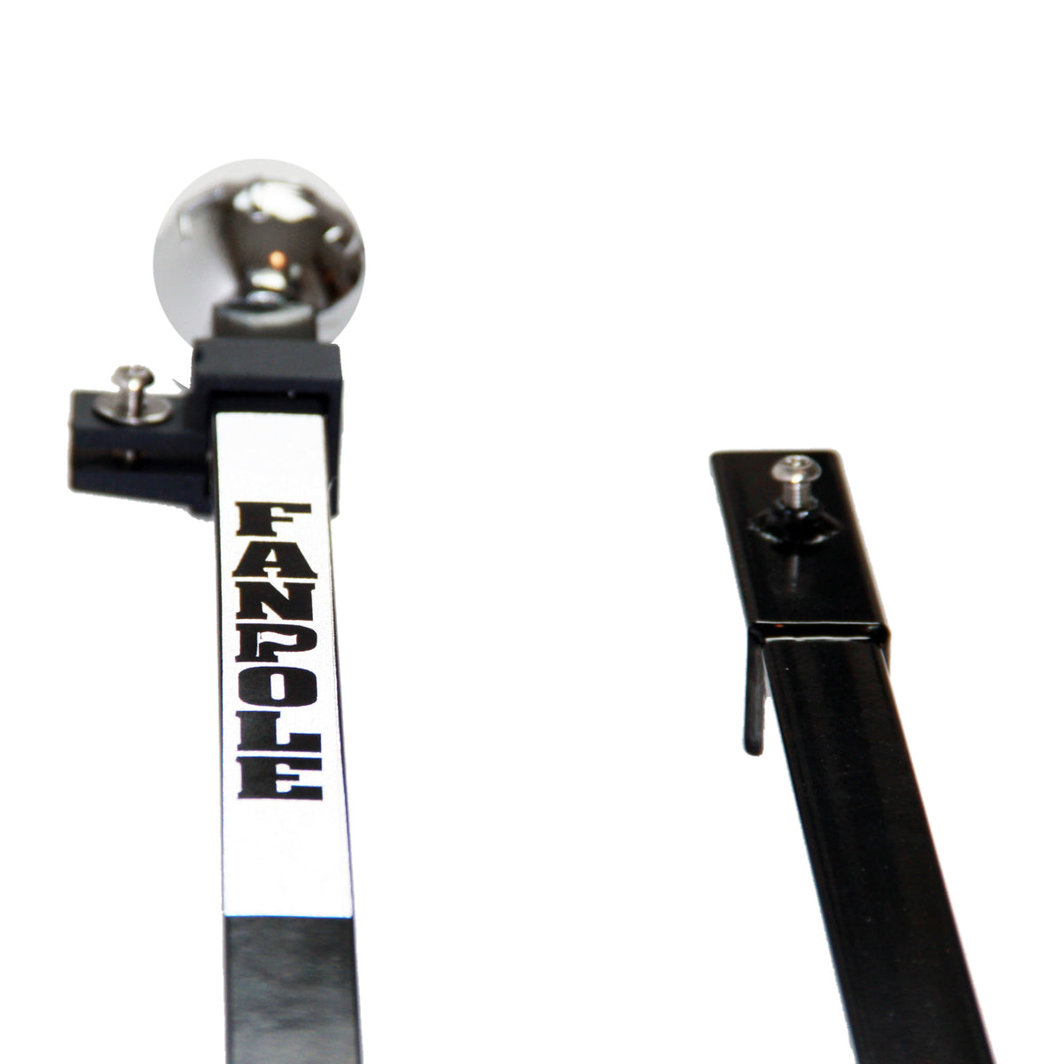 Close-up of the FanPole upper pole with chrome ball finial, flag clamp with thumb screw and FANPOLE label, next to the top of the lower pole section