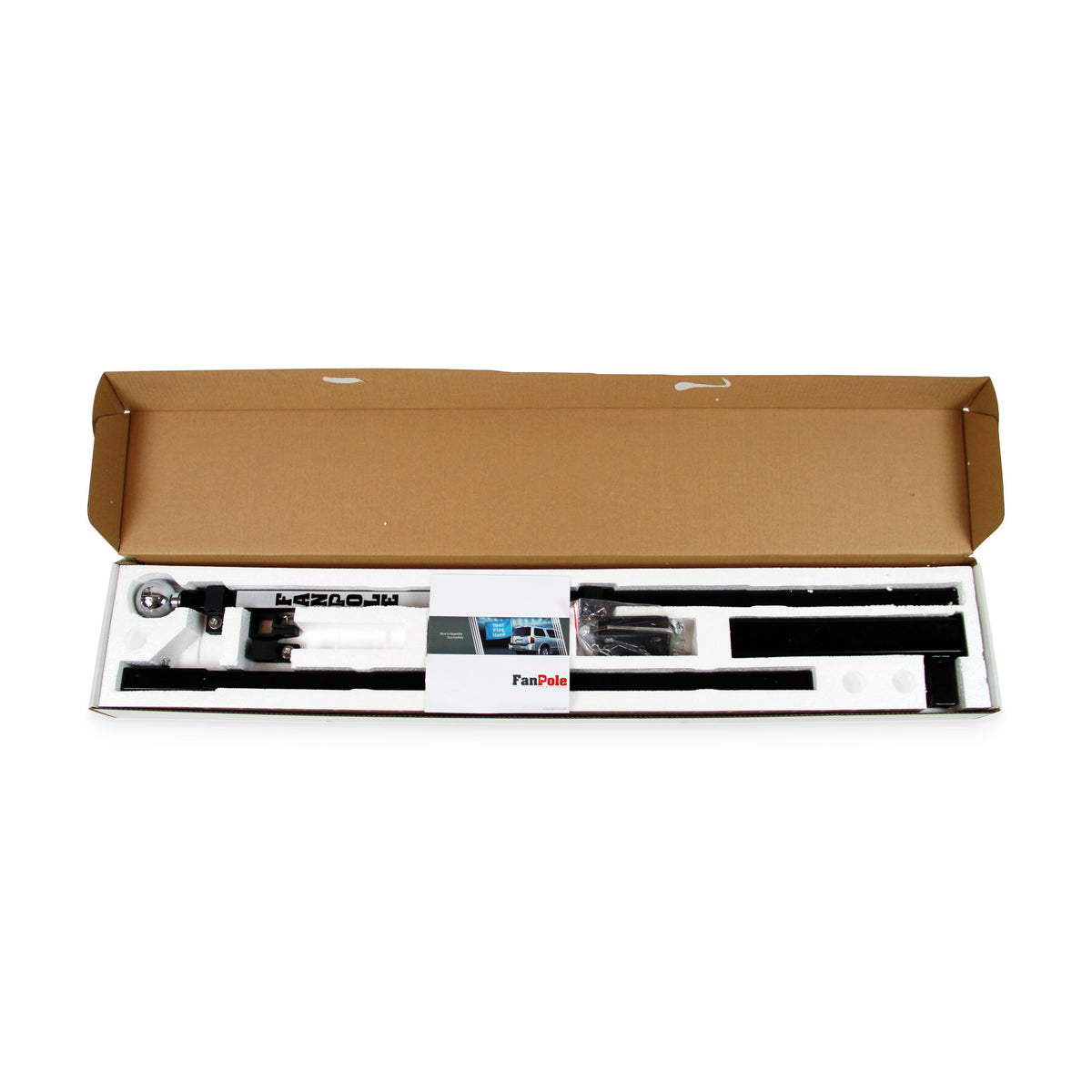 Open FanPole truck hitch flag pole kit box showing the two-piece steel pole with ball finial, dummy hitch and hardware packed in a foam insert